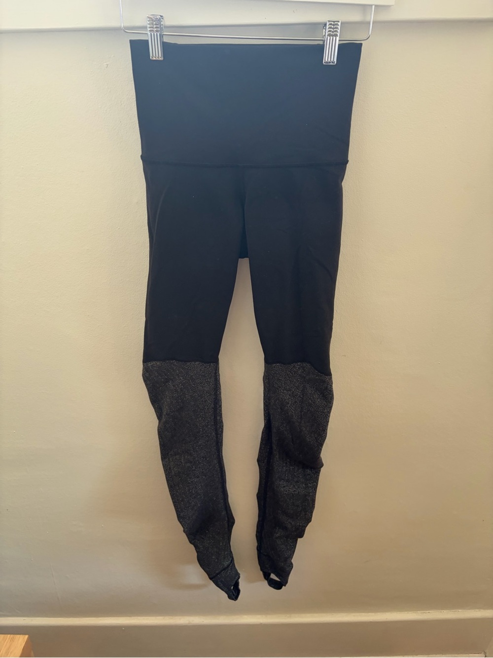 Lululemon black leggings with gray heathered fabric on the lower legs size 4